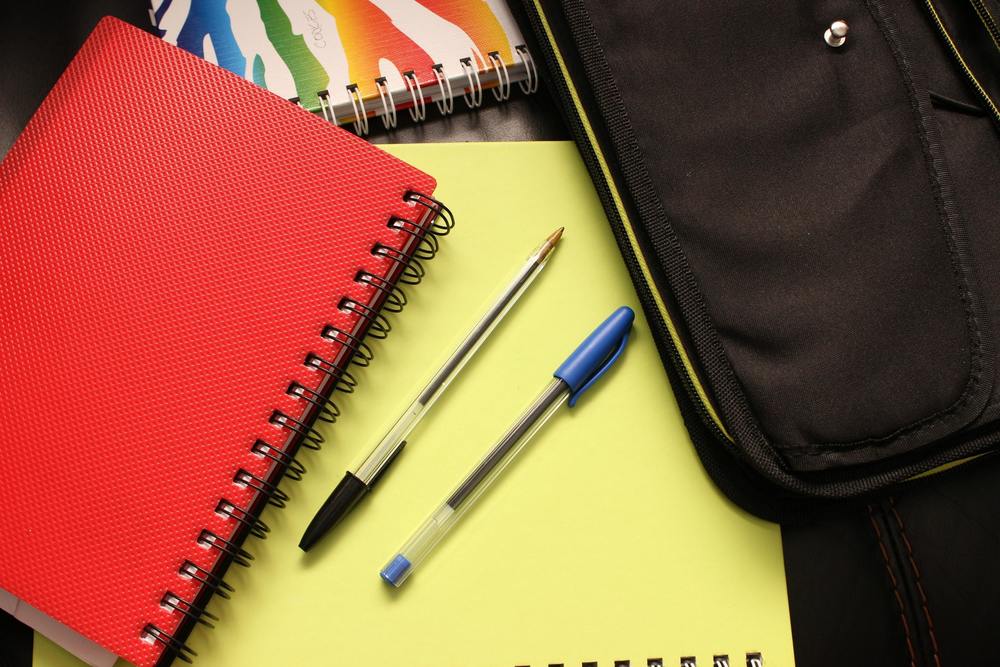 pens on notebooks
