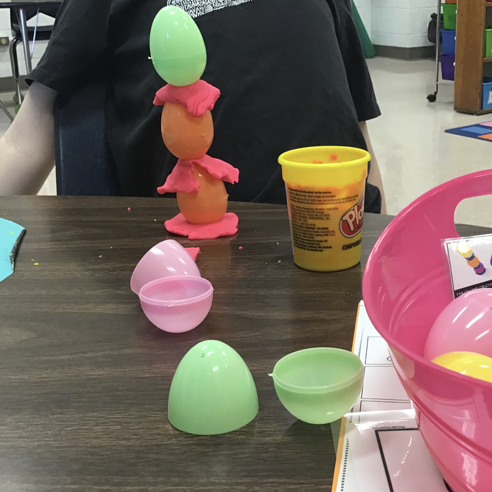 Tower with eggs and play-doh. We got 3 eggs high on this one.